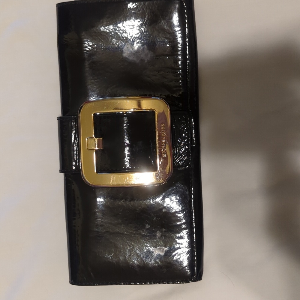 Michael Kors Black patent leather clutch.